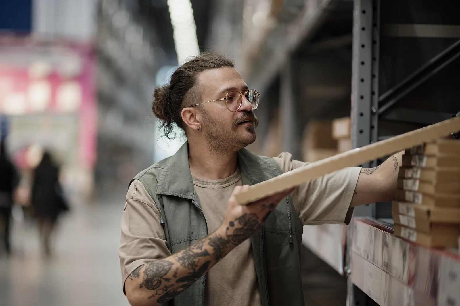 Stock being pulled from warehouse shelving